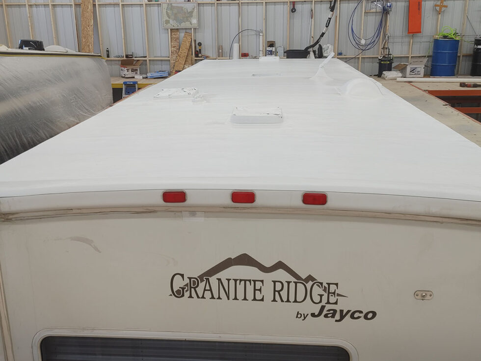 Class C RV Roof being repaired