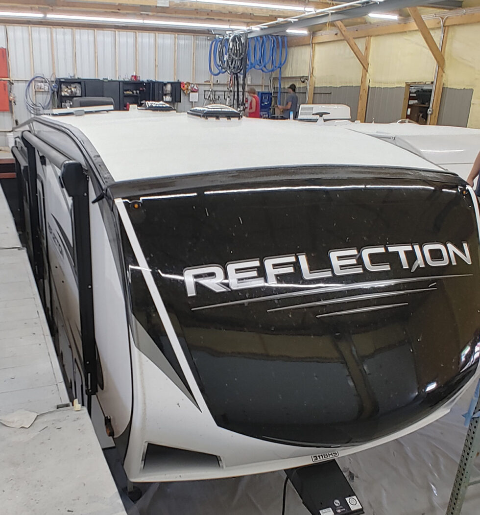 fifth wheel rv roof being repaired