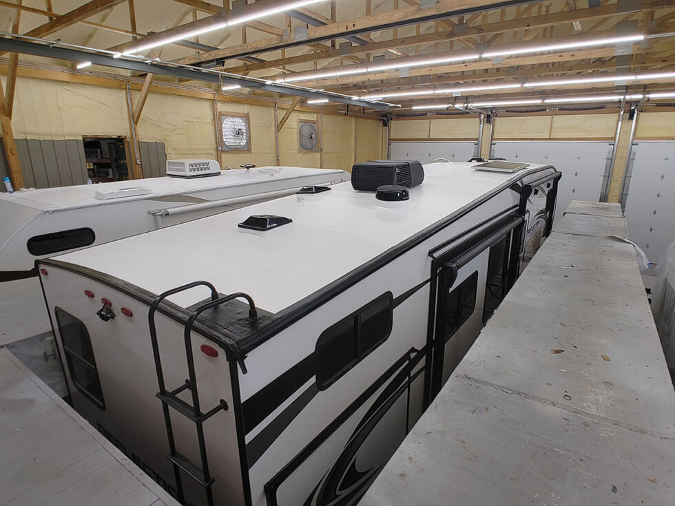 fifth wheel rv roof being repaired