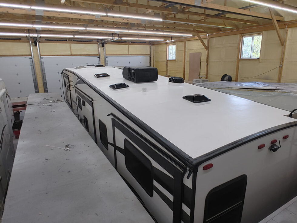 fifth wheel rv roof being repaired