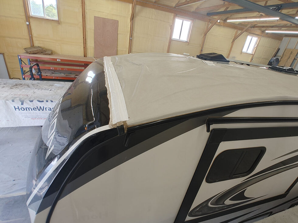 fifth wheel rv roof being repaired