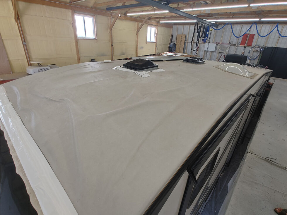 fifth wheel rv roof being repaired