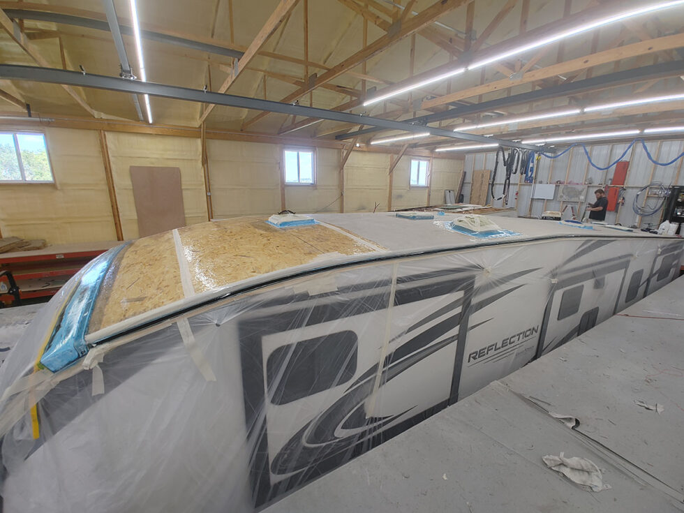 fifth wheel rv roof being repaired