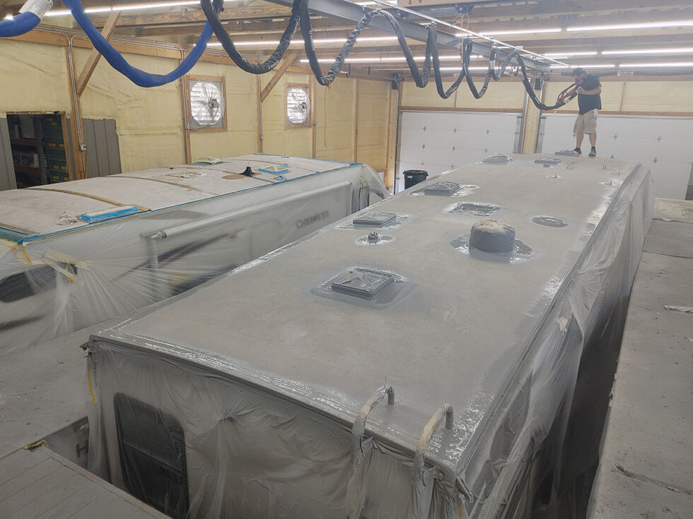 fifth wheel rv roof being repaired