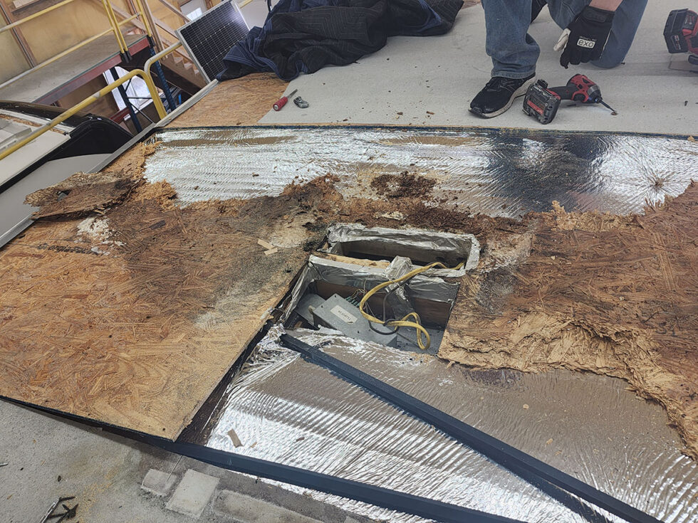 fifth wheel rv roof being repaired