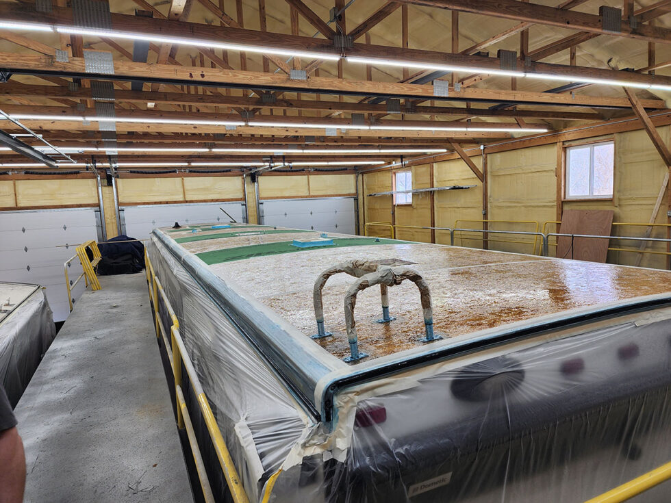 fifth wheel rv roof being repaired