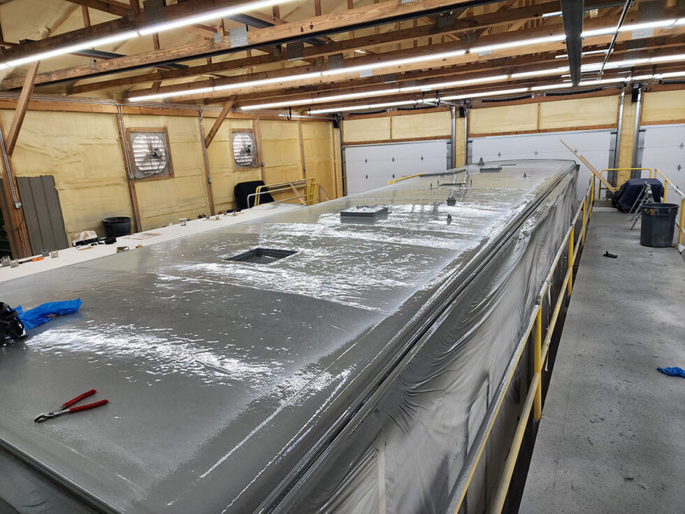 fifth wheel rv roof being repaired