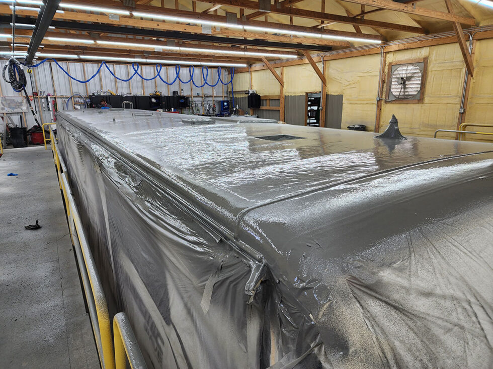 fifth wheel rv roof being repaired