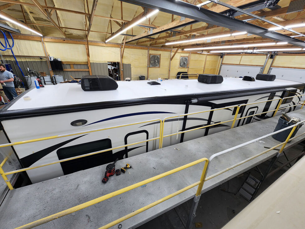 fifth wheel rv roof being repaired