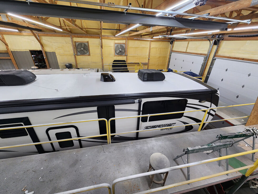 fifth wheel rv roof being repaired