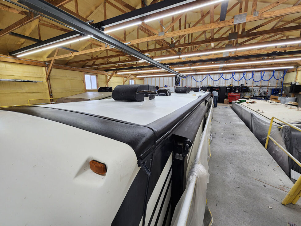 fifth wheel rv roof being repaired