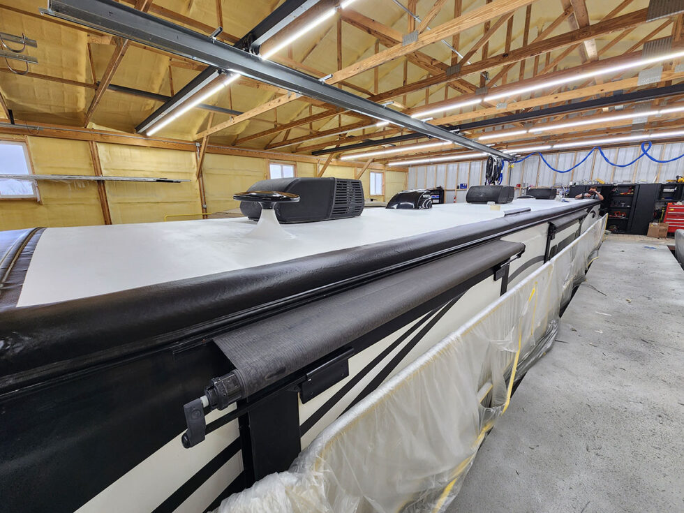 fifth wheel rv roof being repaired