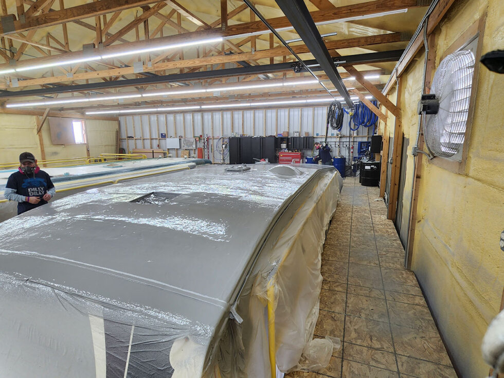 fifth wheel rv roof being repaired