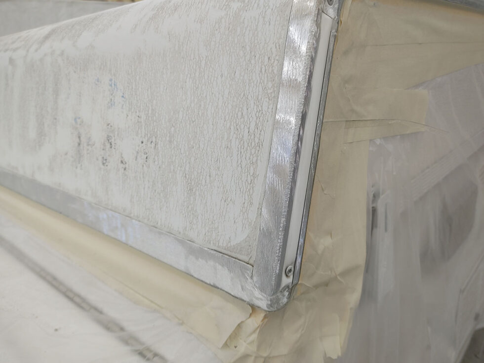 Pop Up camper having roof repaired after hail damage