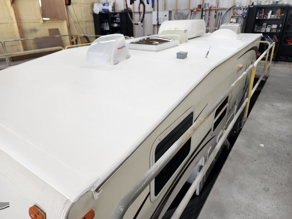 Truck camper roof being repaired