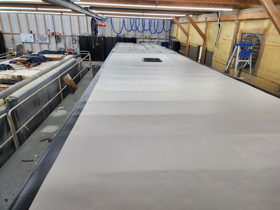 custom race car trailer finished FlexArmor roof in the shop