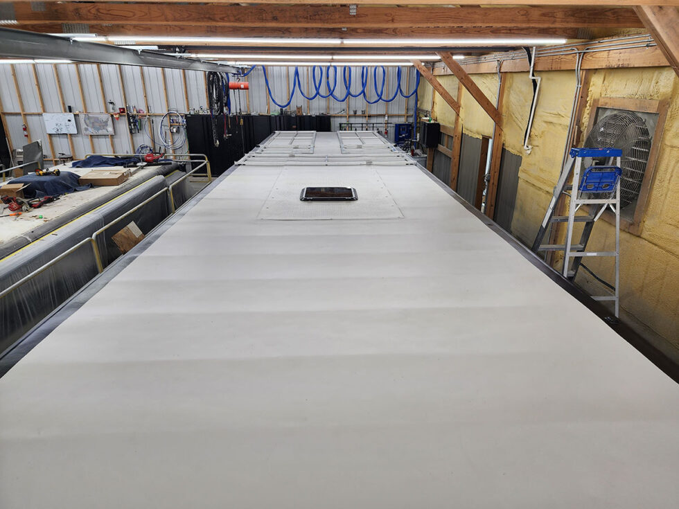 custom race car trailer finished FlexArmor roof in the shop