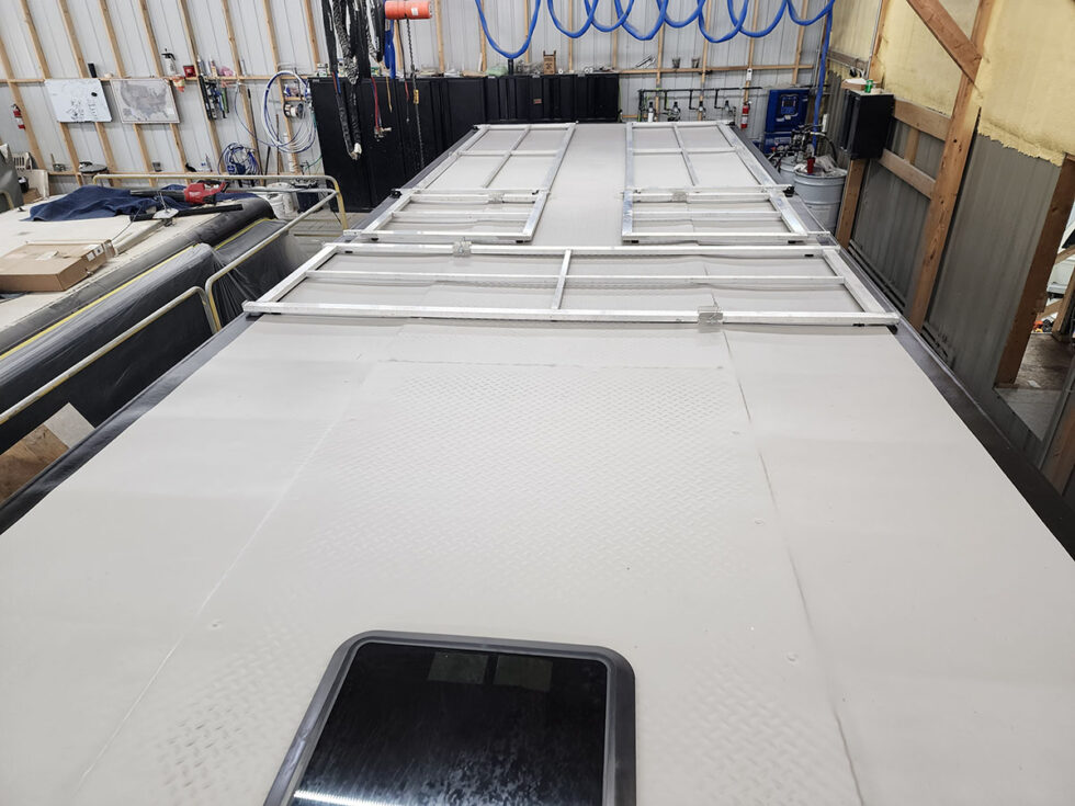 custom race car trailer finished FlexArmor roof in the shop