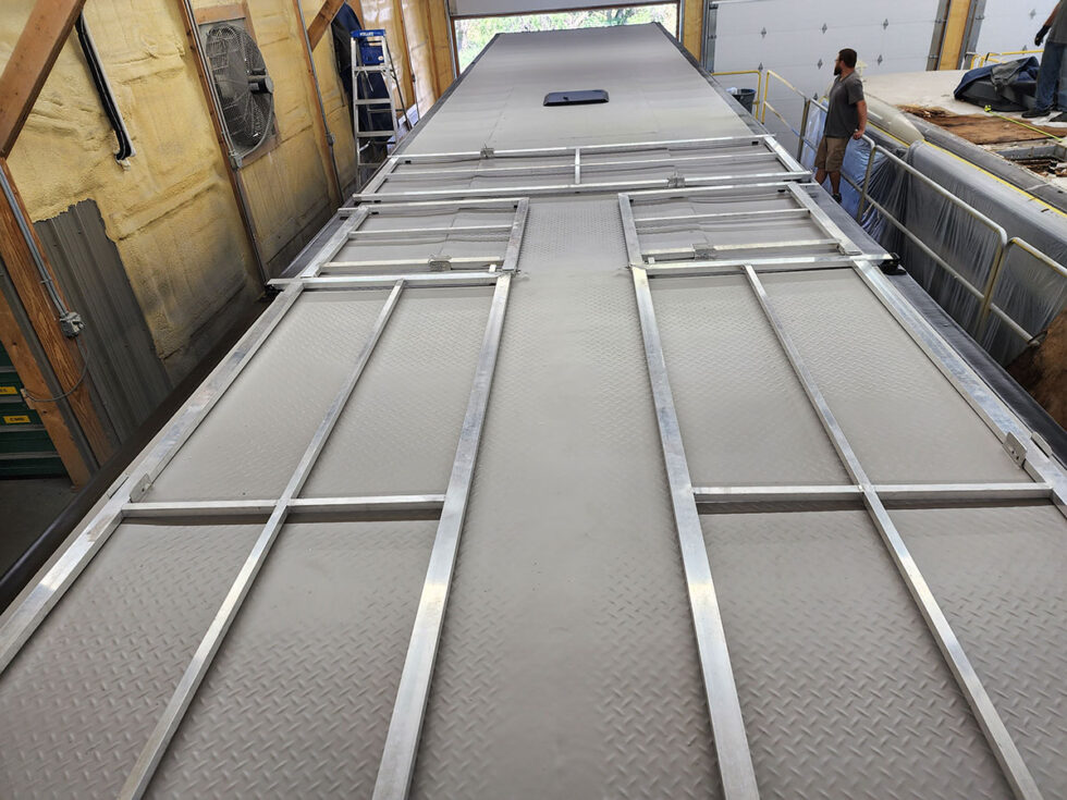 custom race car trailer before FlexArmor roof in the shop