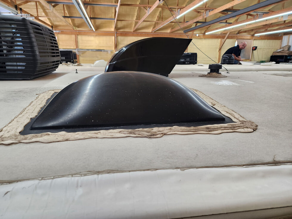 RV in Midwest RV Roof shop for new roof