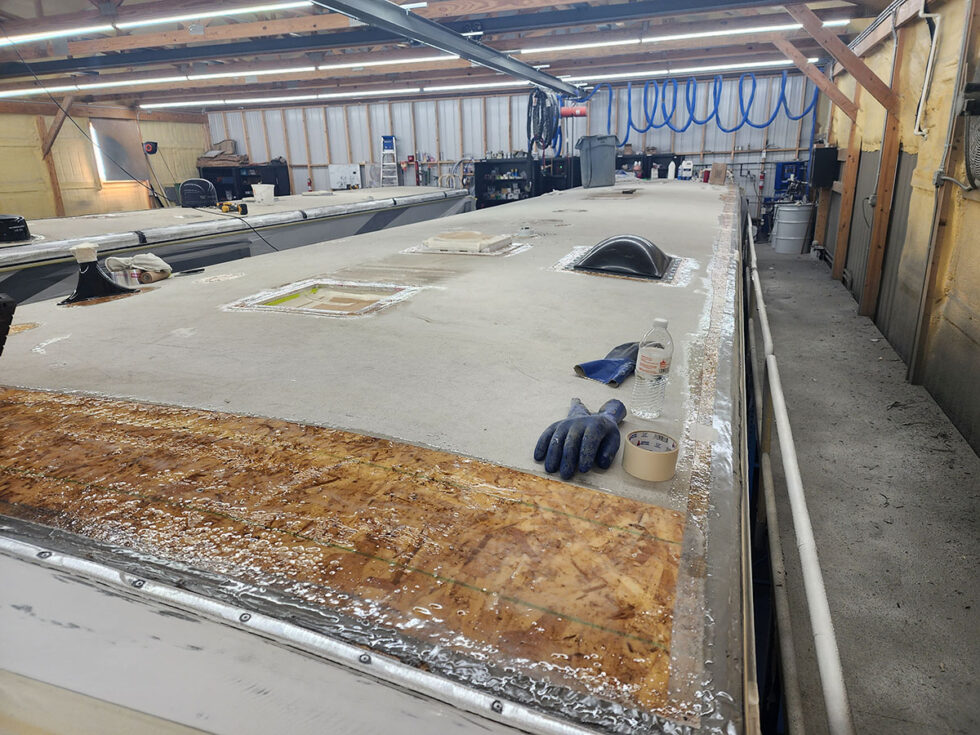 RV in Midwest RV Roof shop for new roof