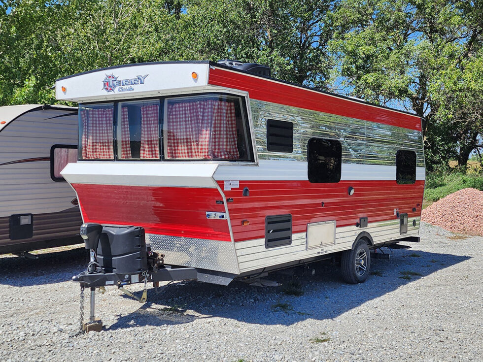 red and chrome terry classic rv from the side