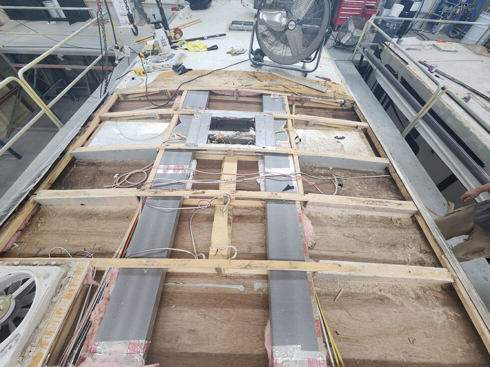 damaged RV in shop for a new roof