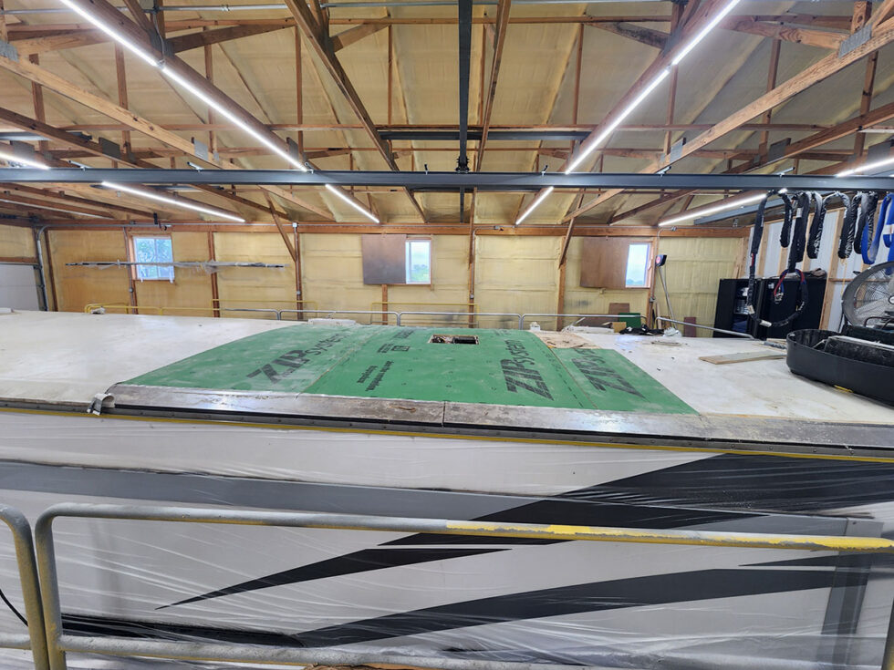 damaged RV in shop for a new roof