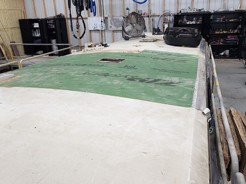 damaged RV in shop for a new roof