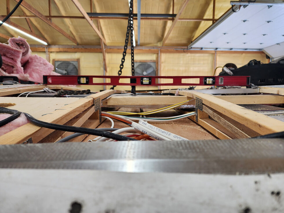 damaged RV in shop for a new roof