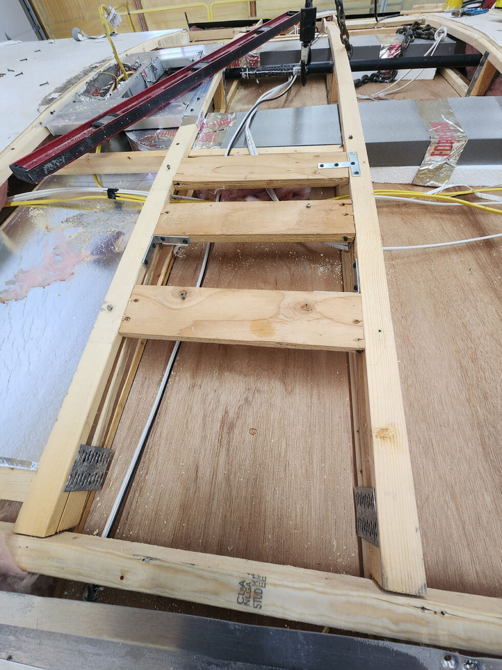 damaged RV in shop for a new roof