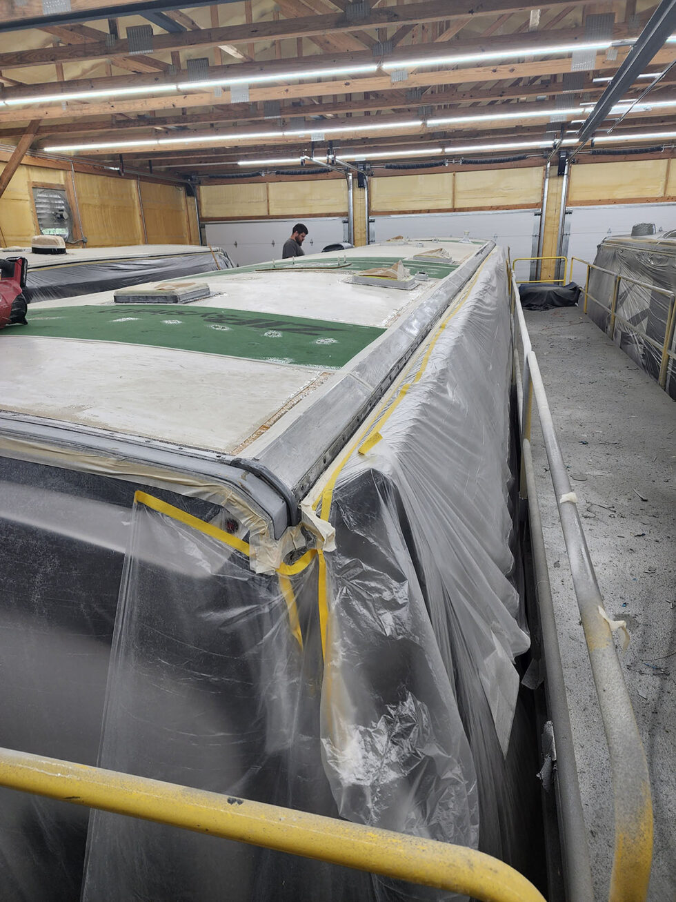 damaged RV in shop for a new roof