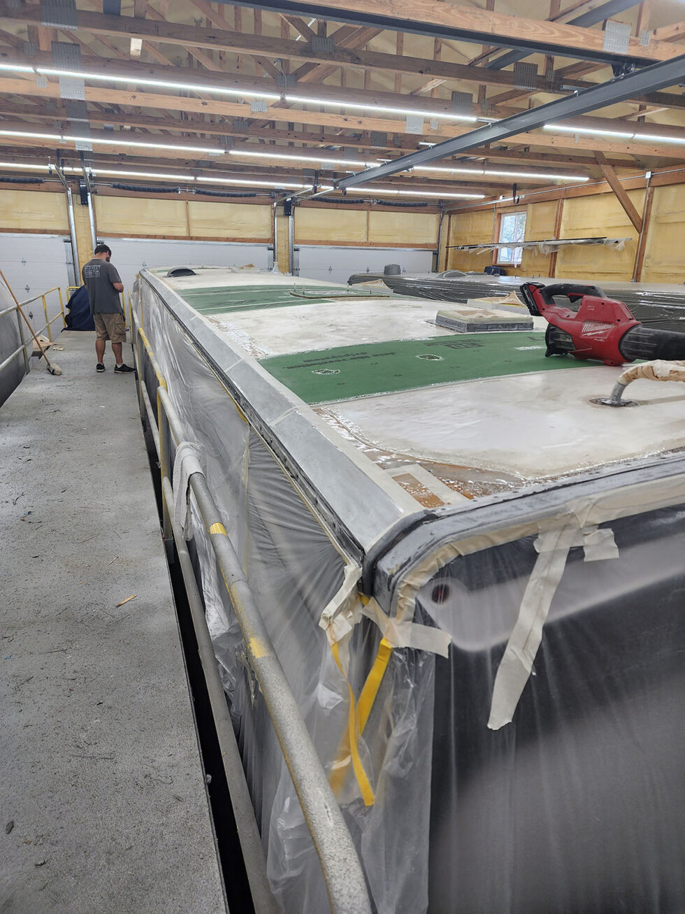 damaged RV in shop for a new roof